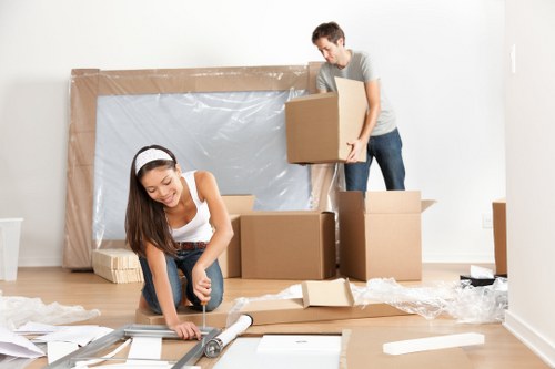 Workers and moving van representing ethical logistics standards