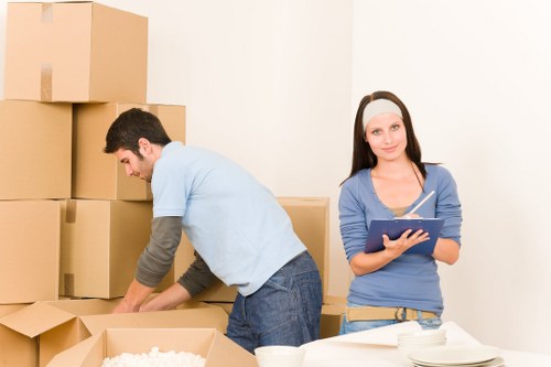 Household boxes and furniture being loaded for transport